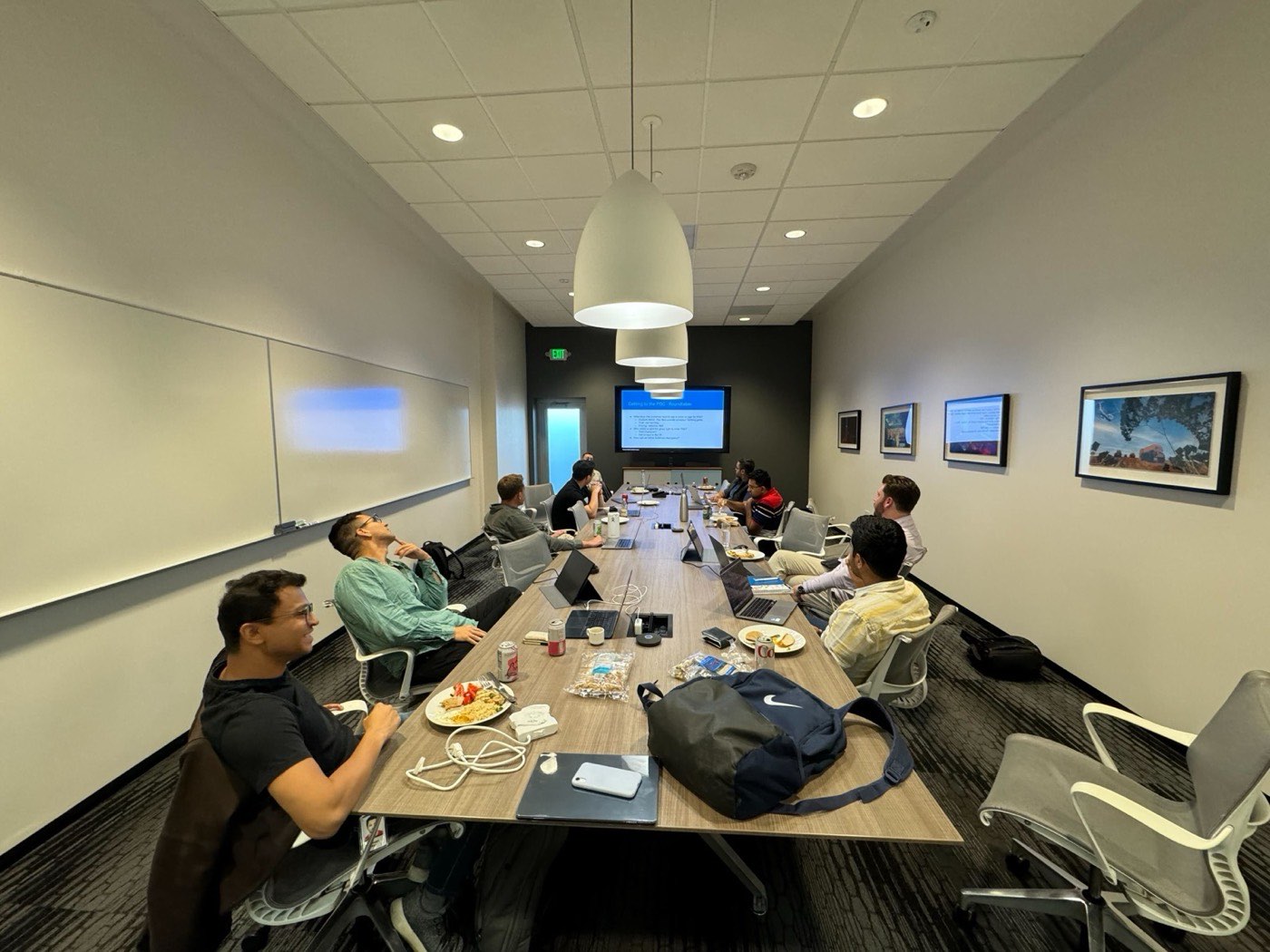 Early team meeting in a small conference room