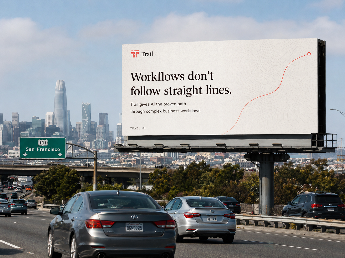 A Trail billboard beside a highway